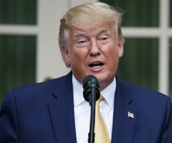 president donald trump speaking to reporters at the white house