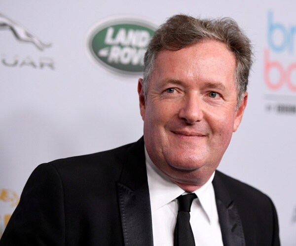 piers morgan walks red carpet