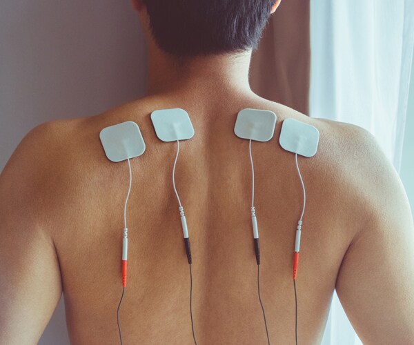 nerve stimulation on a patient's back