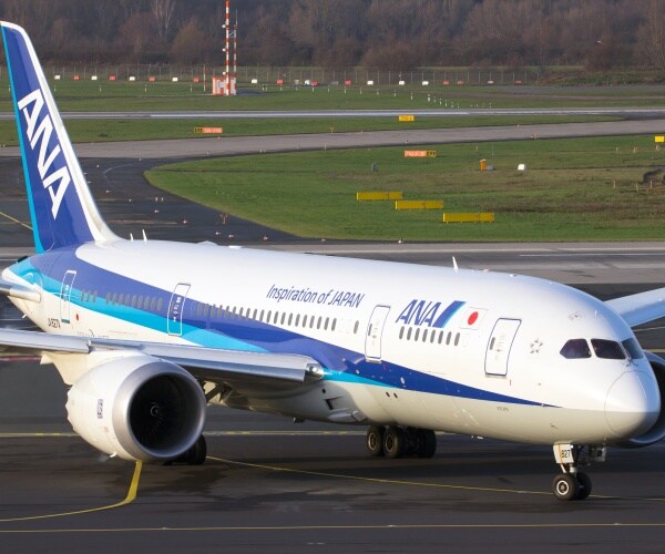 All Nippon Airways (ANA) Boeing 787 Dreamliner taxiing on Dusseldorf airport after landing.