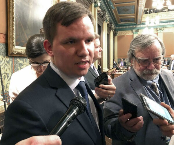 rep. james lower speaks to reporters in michigan