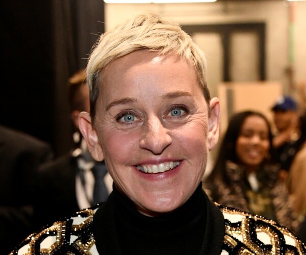 degeneres in a black and white top with gold and black sequins