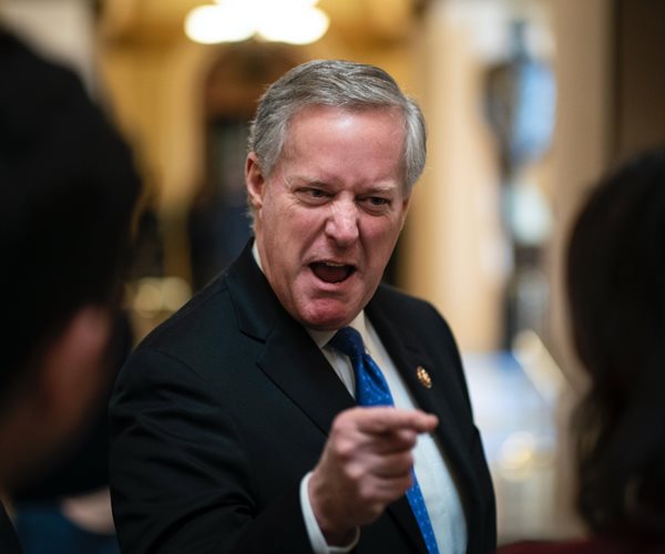 rep. mark meadows grimaces as he points with his right index finger as he speaks to reporters