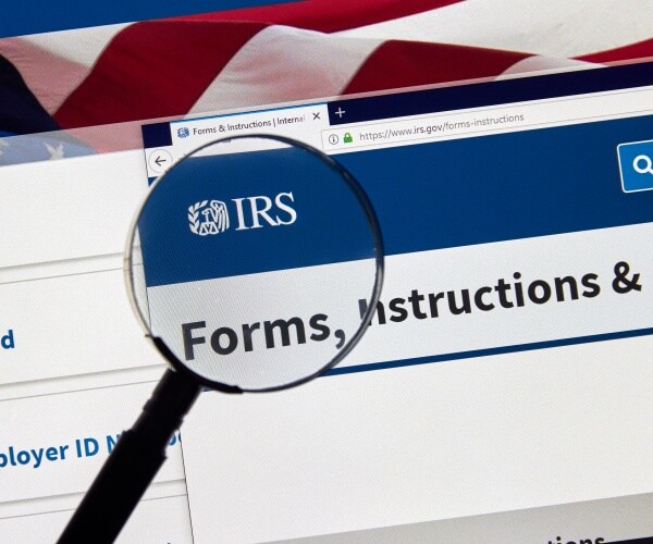 irs website is shown with a magnifying glass