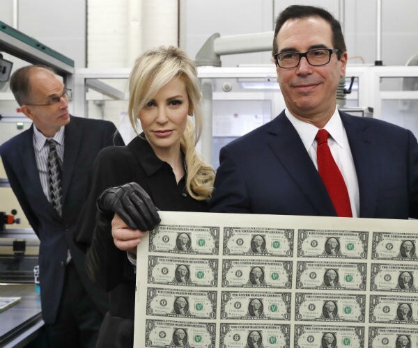 Treasury Head, Wife Mocked for Photo of Them Holding Money