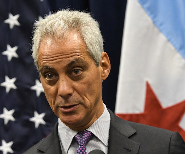 rahm emanuel looks down during a news conference when he was the mayor of chicago