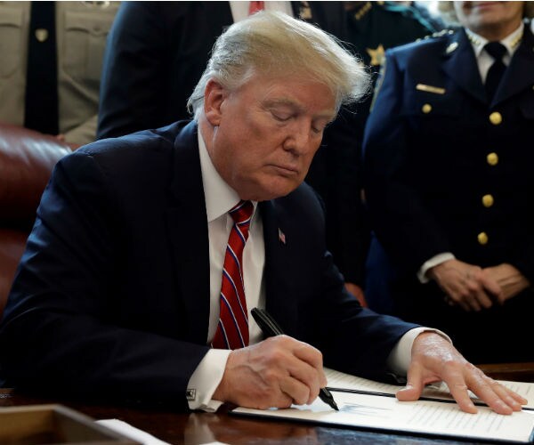 us president donald j trump signing his first veto in office in march of this year 