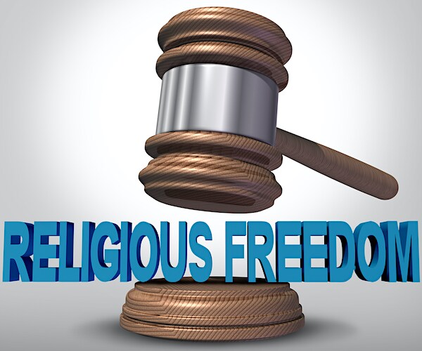 a graphic showing a gavel coming down on the words religious freedom