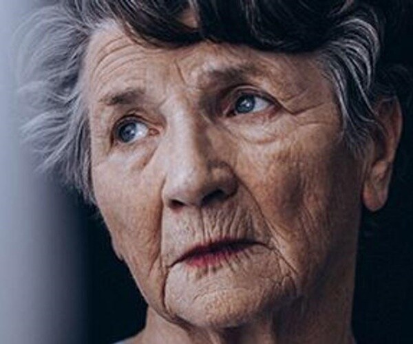 older woman looking worried