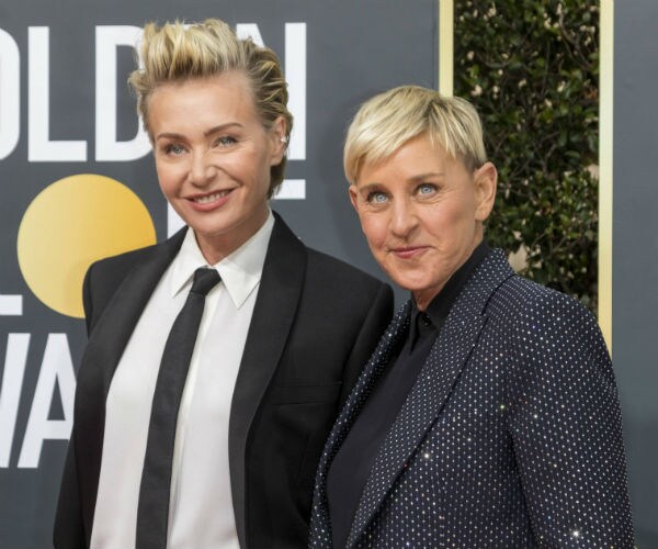 Ellen DeGeneres and Portia De Rossi are seen at an event