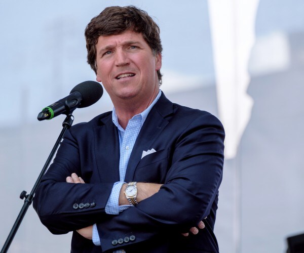 Dick Morris: Tucker Carlson's Dangerous Pro-Russian Stance Continues