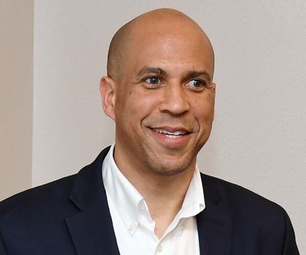 cory booker speaks to an audience