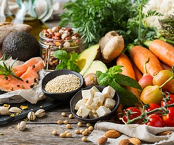 table full of vegetables and plant-based proteins