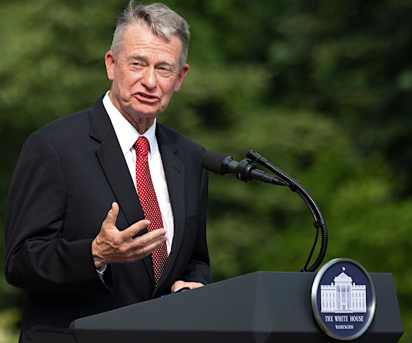 brad little speaks from a podium at the white house