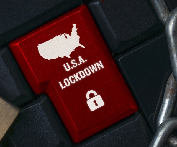 a black computer keyboard with a red return key surrounded by a chain and a lock with the united states of america  