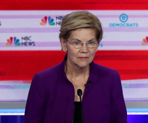 elizabeth warren speaks from the stage.