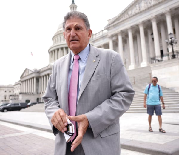 Manchin, Schumer Report Abrupt Deal on Health, Energy, Taxes