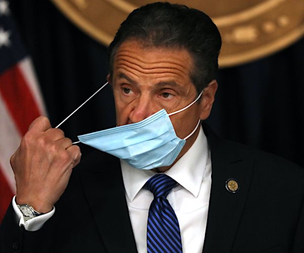 andrew cuomo struggles to take off his face mask before a news conference