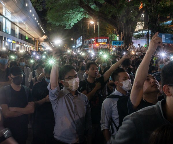 Hong Kong Chaos Sees Tear Gas, Attack on Chinese News Agency