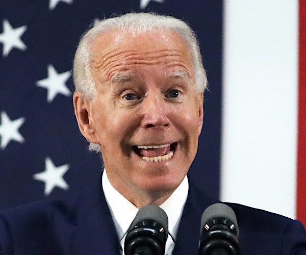 joe biden exults during a democratic presidential primary