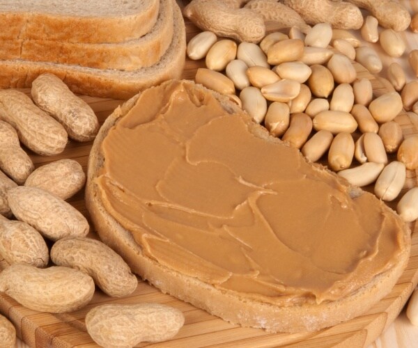 peanuts in shells, shelled peanuts and bread with peanut butter