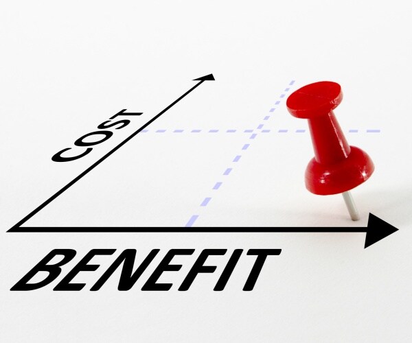 cost benefit analysis concept on a graph with a thumb nail pin target marker