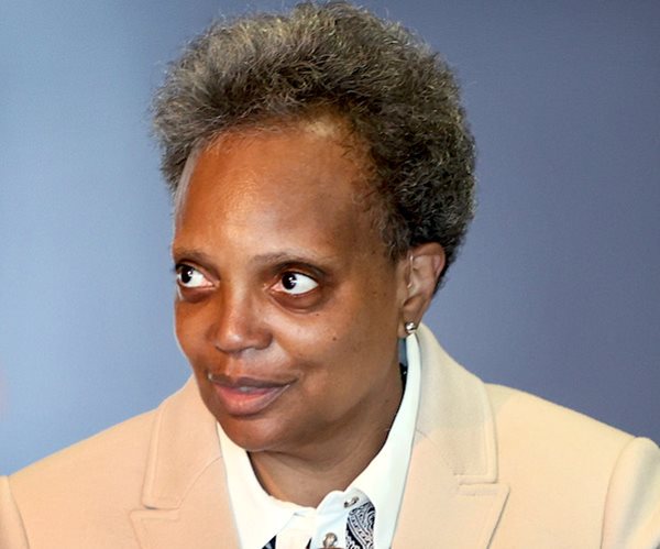 lori lightfoot delivers remarks at a news conference