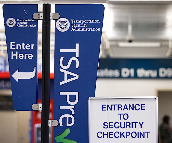 the transportation security administration signs at the airport