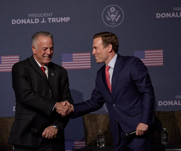 joe lombardo and adam laxalt shake hands