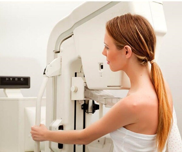 woman getting a mammogram