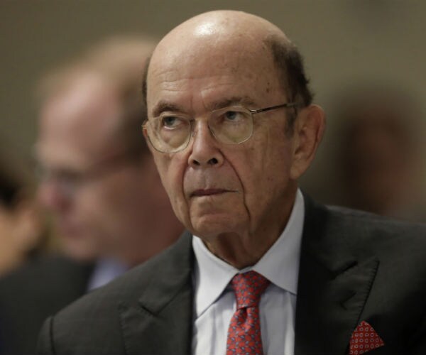 wilbur ross is shown during a hearing