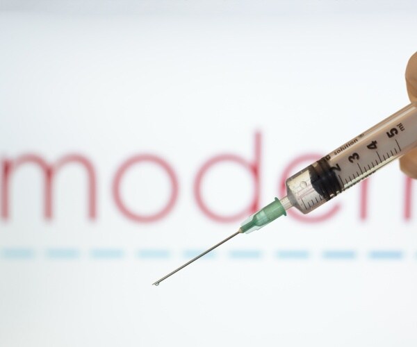 Moderna logo and a syringe