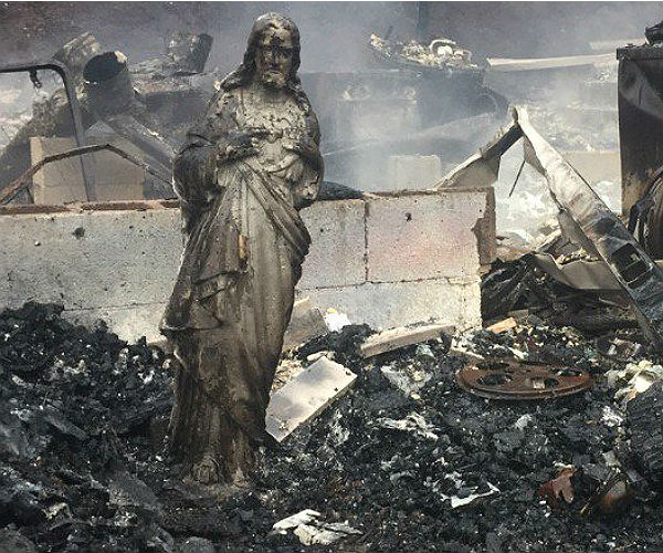 Statue of Jesus Found Intact in House Burned by Tenn. Fires