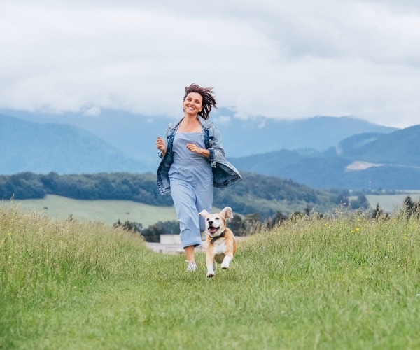 dog running with owner