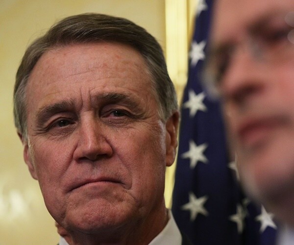 david perdue listens to grover norquist talk about tax reform