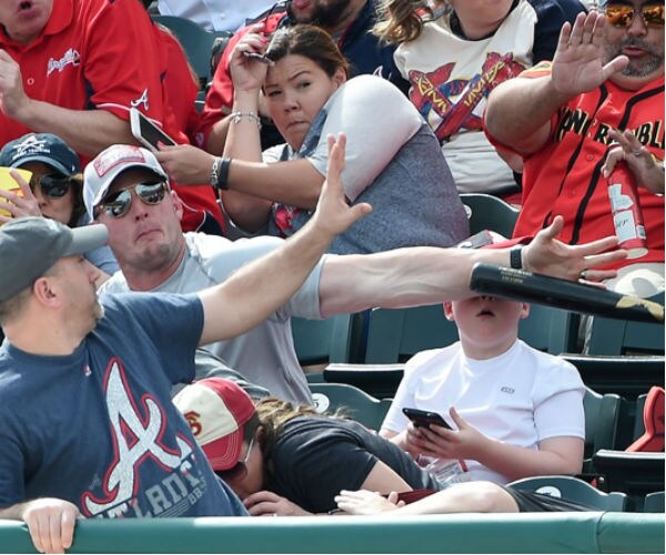 Fan Saves Boy From Getting Hit by Baseball Bat in Amazing Photo