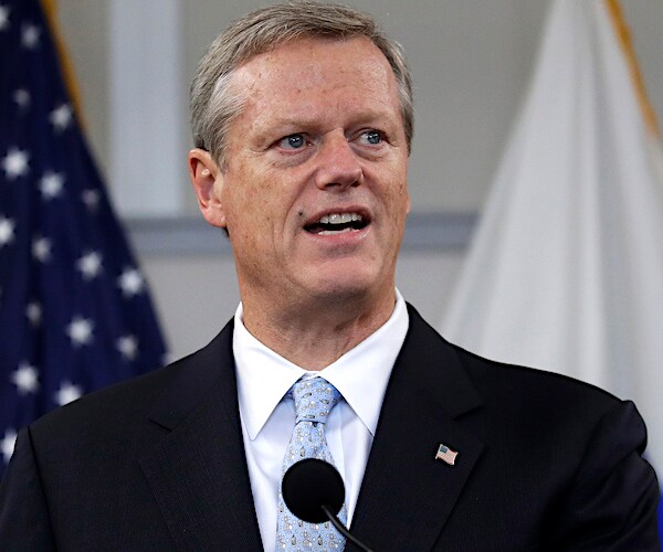 charlie baker speaks at a news conference