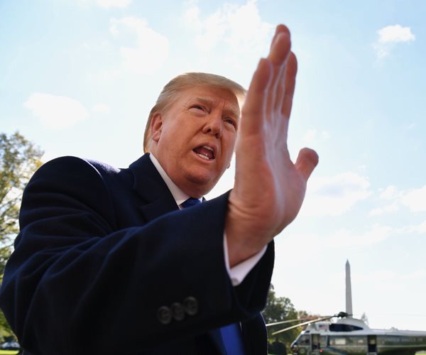 donald trump speaks to reporters outdoors