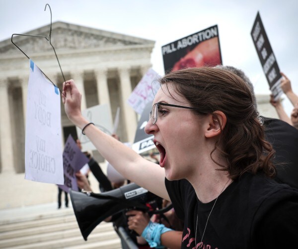 anti abortion and pro abortion activists protest in washington dc 