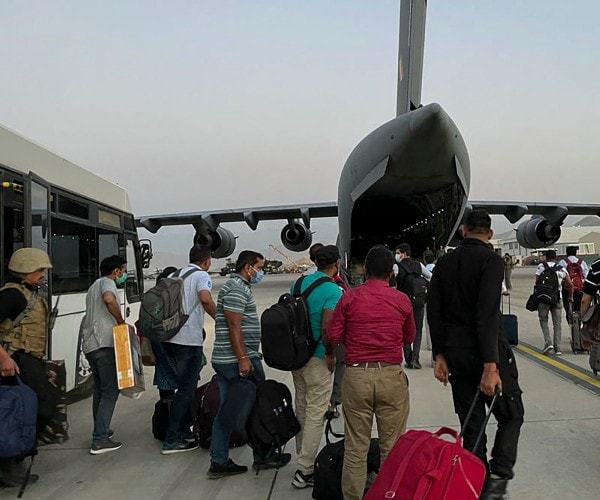 nationals from india board an indian military aircraft at kabul airport