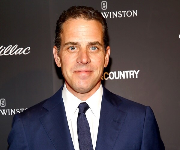 hunter biden poses for a photo