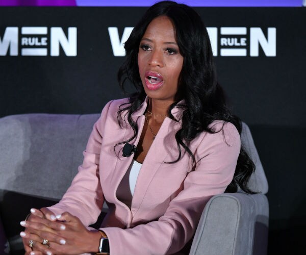 mia love speaks during a conference 