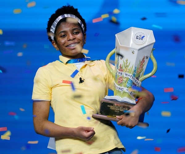 zaila avant garde holds trophy as confetti falls