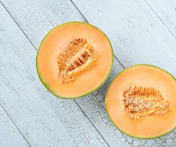 a cantaloupe cut in half