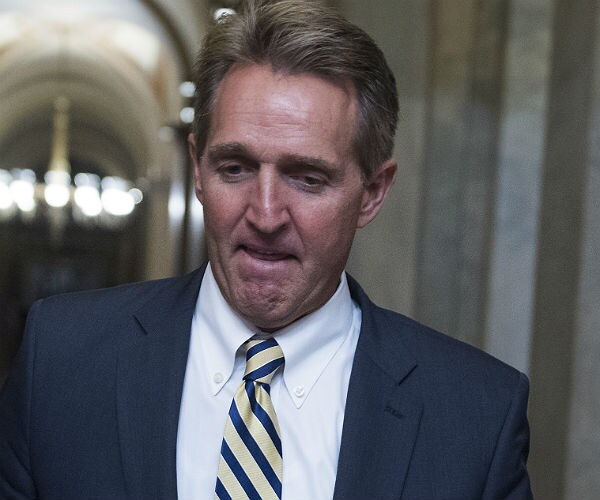 White House Pressures Sen. Flake to Back Trump's Policies