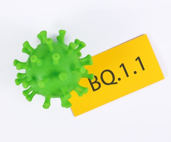 green virus particle and BQ.1.1 in black letters