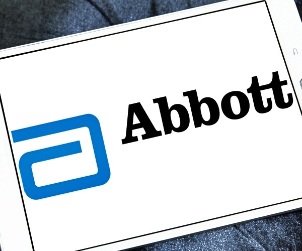 abbott laboratories corporate logo symbol emblem on computer pad screen