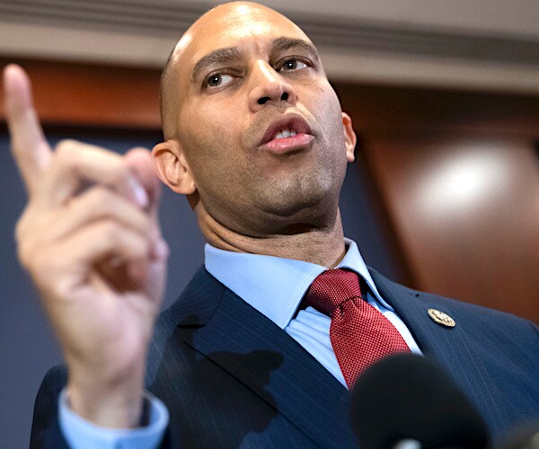 new york democratic representative hakeem jeffries points up with his right index finger while delivering remarks