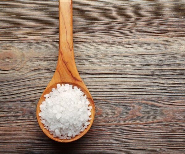 salt on a wood spoon