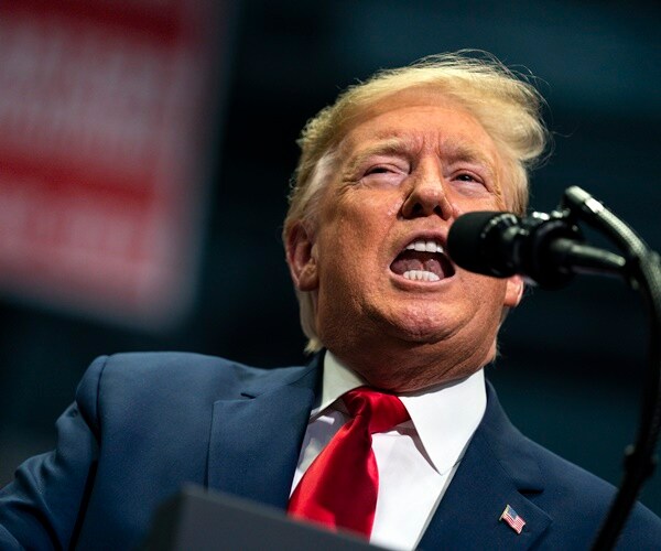 President Donald Trump speaks during a campaign rally at Bojangles Coliseum on Monday in Charlotte.